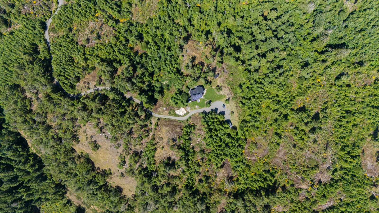 Aerial mountaintop perspective over ridge and valley view