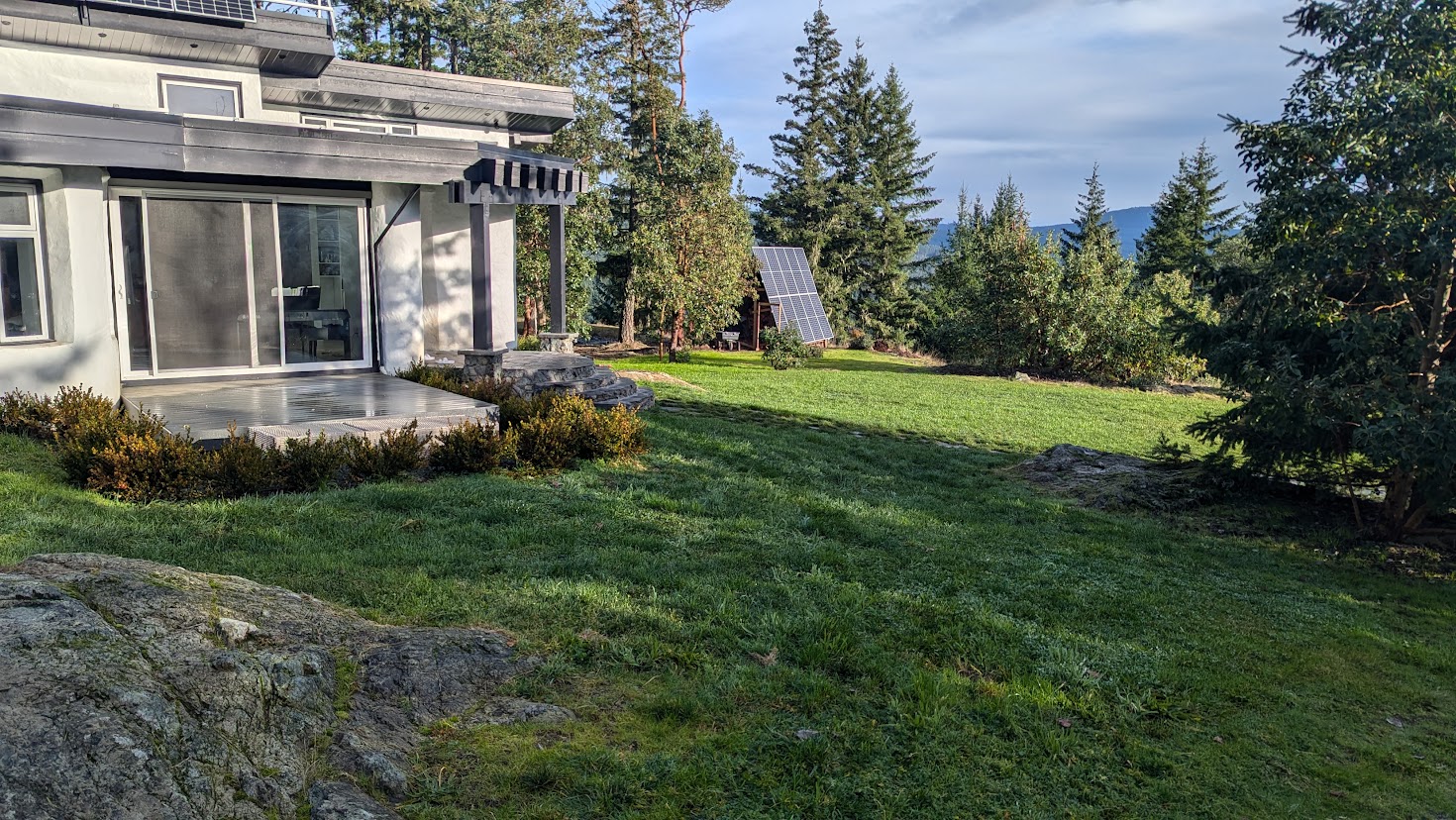 House exterior angle showing mountaintop privacy and usable grounds